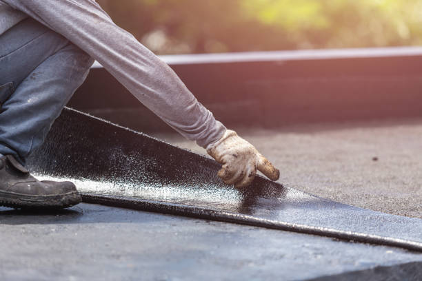 Professional Basement Waterproofing technician working in Baldwinsville, NY
